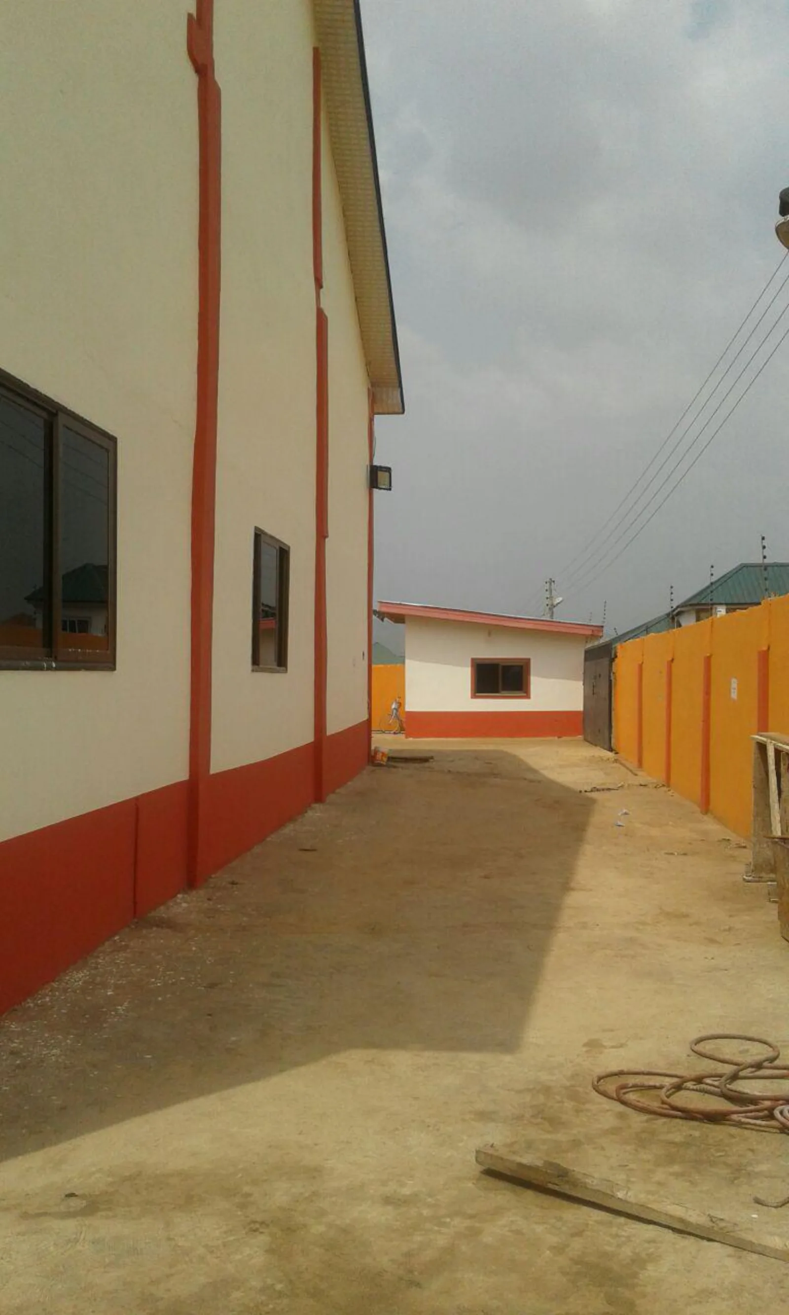 Exterior side yard and access lane of the Oyarifa factory compound